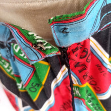 Laden Sie das Bild in den Galerie-Viewer, 1960s 1970s - Gorgeous Novelty Print Stamps Skirt - W27 (68cm)